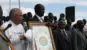 Daniel presenting gifts of peace to the Ministers of the Government of Southern Sudan (GOSS)